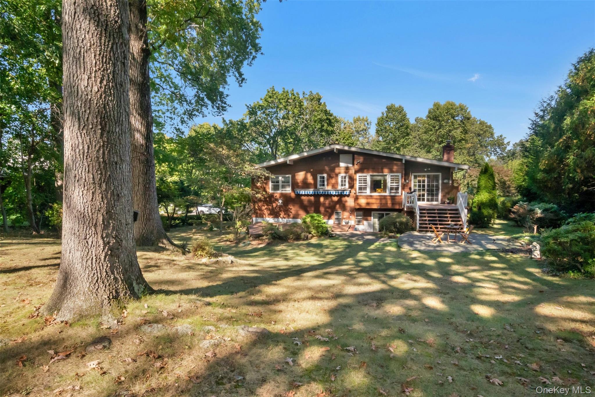 95 Emerson Avenue New Rochelle, NY 10801 - Photo 25 of 27 a view of a house with a yard