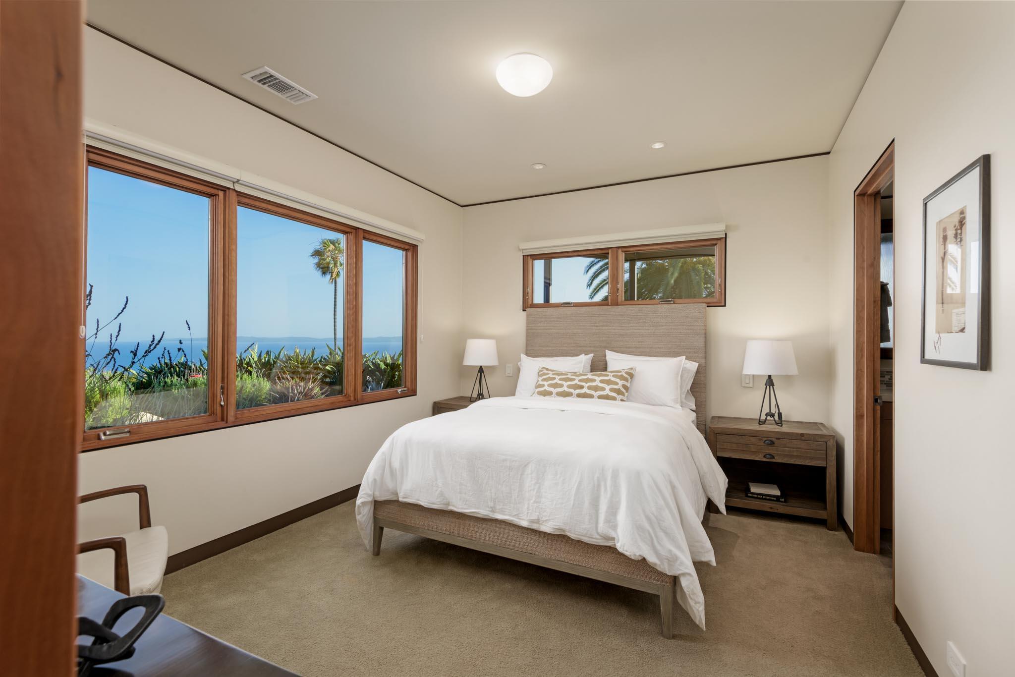 50 Rincon Vista Road Santa Barbara, CA 93103 - Photo 39 of 47 a bedroom with a bed and a large window