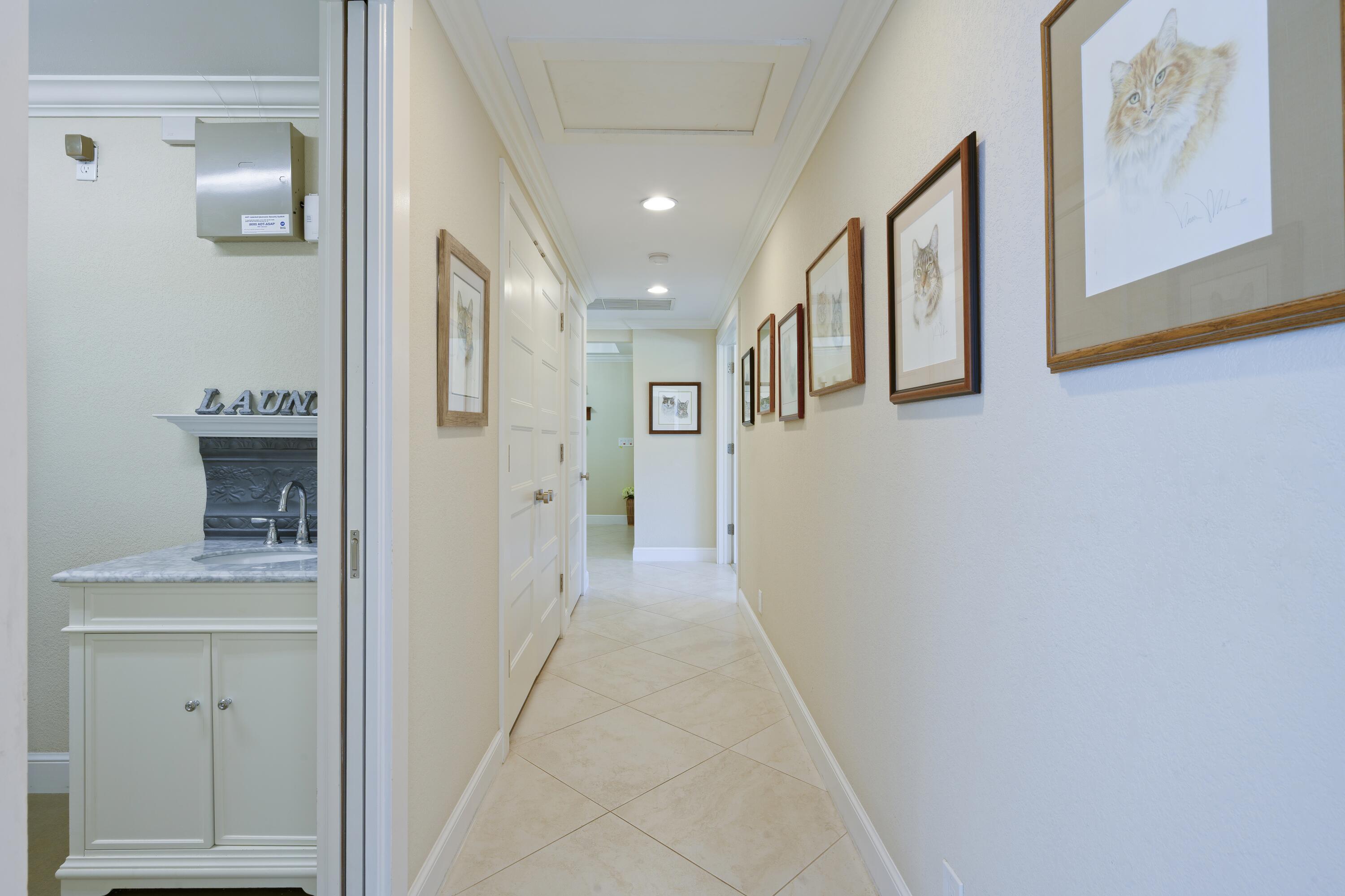 4535 Oak Tree Court Delray Beach, FL 33445 - Photo 17 of 43 a view of hallway with livingroom