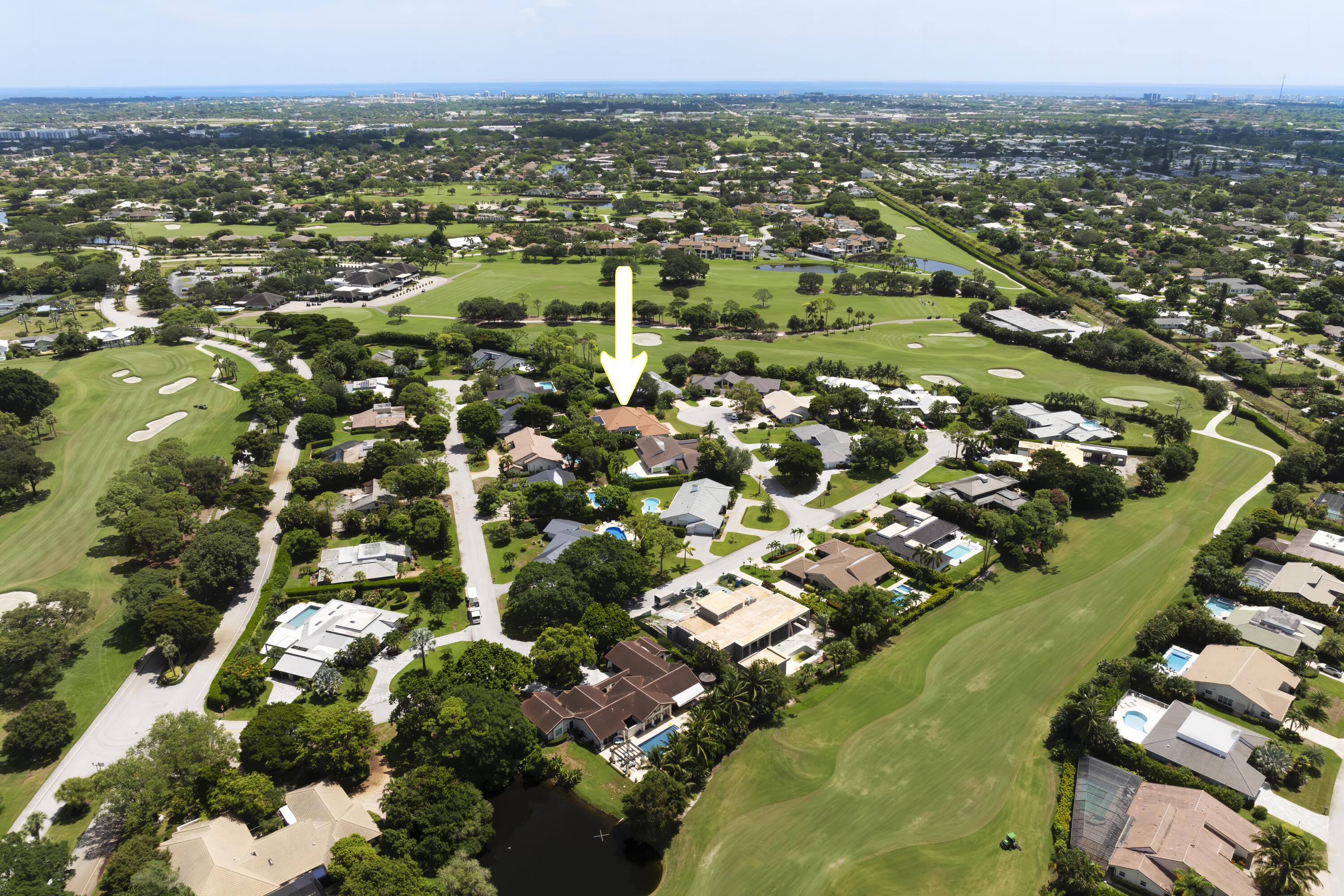 4535 Oak Tree Court Delray Beach, FL 33445 - Photo 38 of 43 an aerial view of residential houses with outdoor space