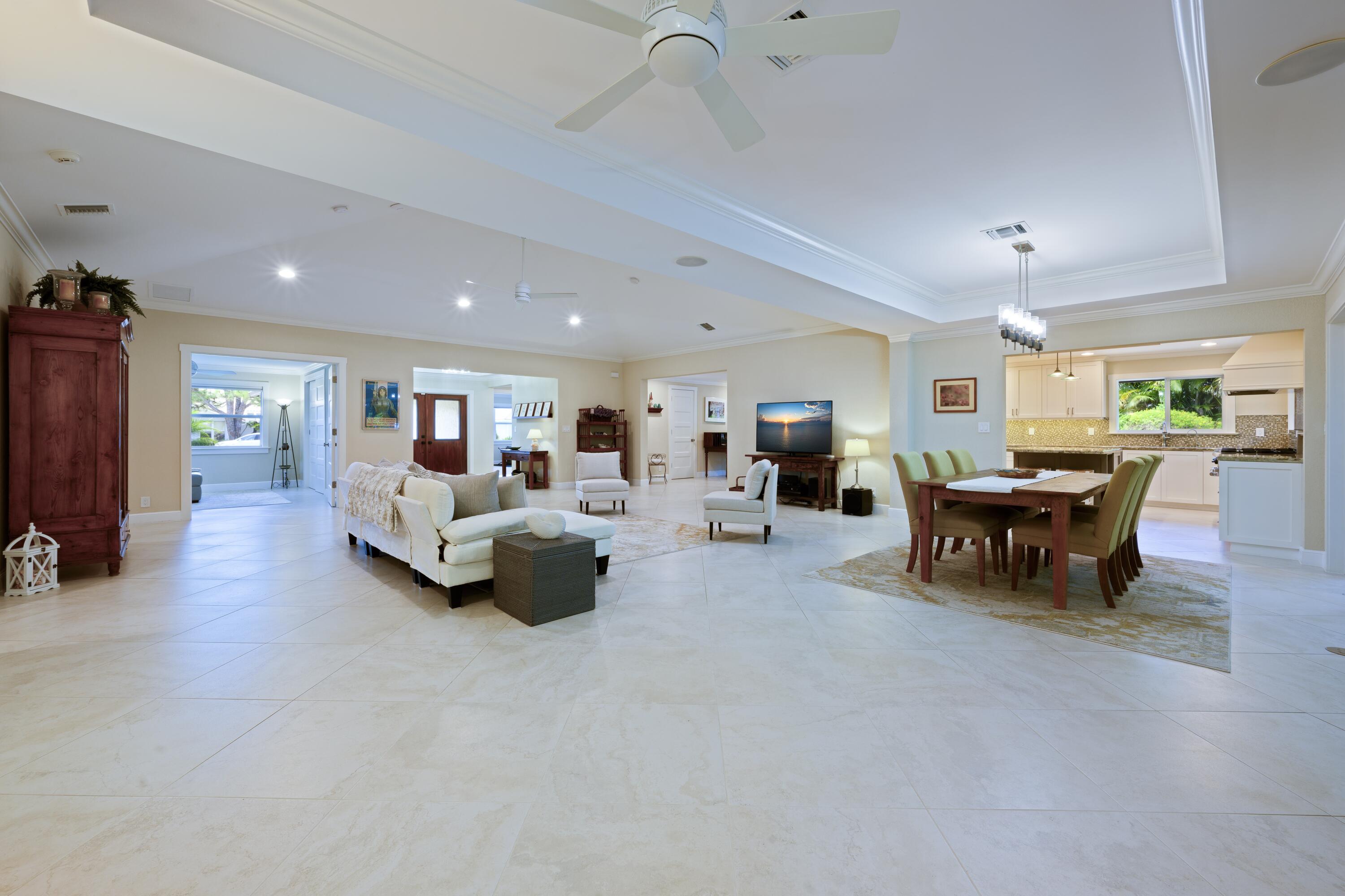 4535 Oak Tree Court Delray Beach, FL 33445 - Photo 10 of 43 a living room with furniture and a piano