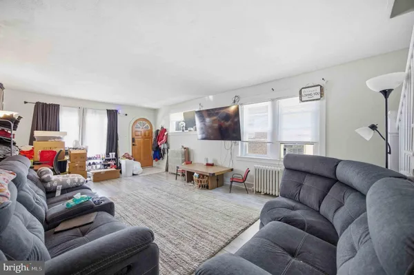 a living room with furniture and a couch