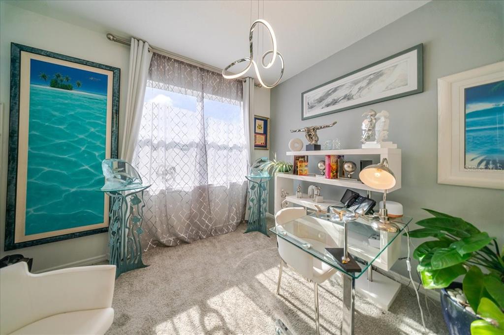 1833 Spring Shower Circle Kissimmee, FL 34744 - Photo 12 of 51 a workspace with furniture and a window