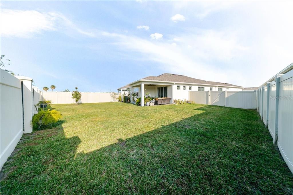 1833 Spring Shower Circle Kissimmee, FL 34744 - Photo 34 of 51 a view of house with garden