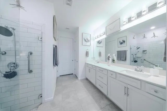 an aerial view of a house with a swimming pool