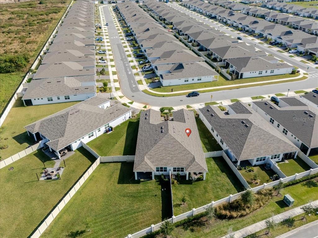 1833 Spring Shower Circle Kissimmee, FL 34744 - Photo 45 of 51 an aerial view of a house with a swimming pool