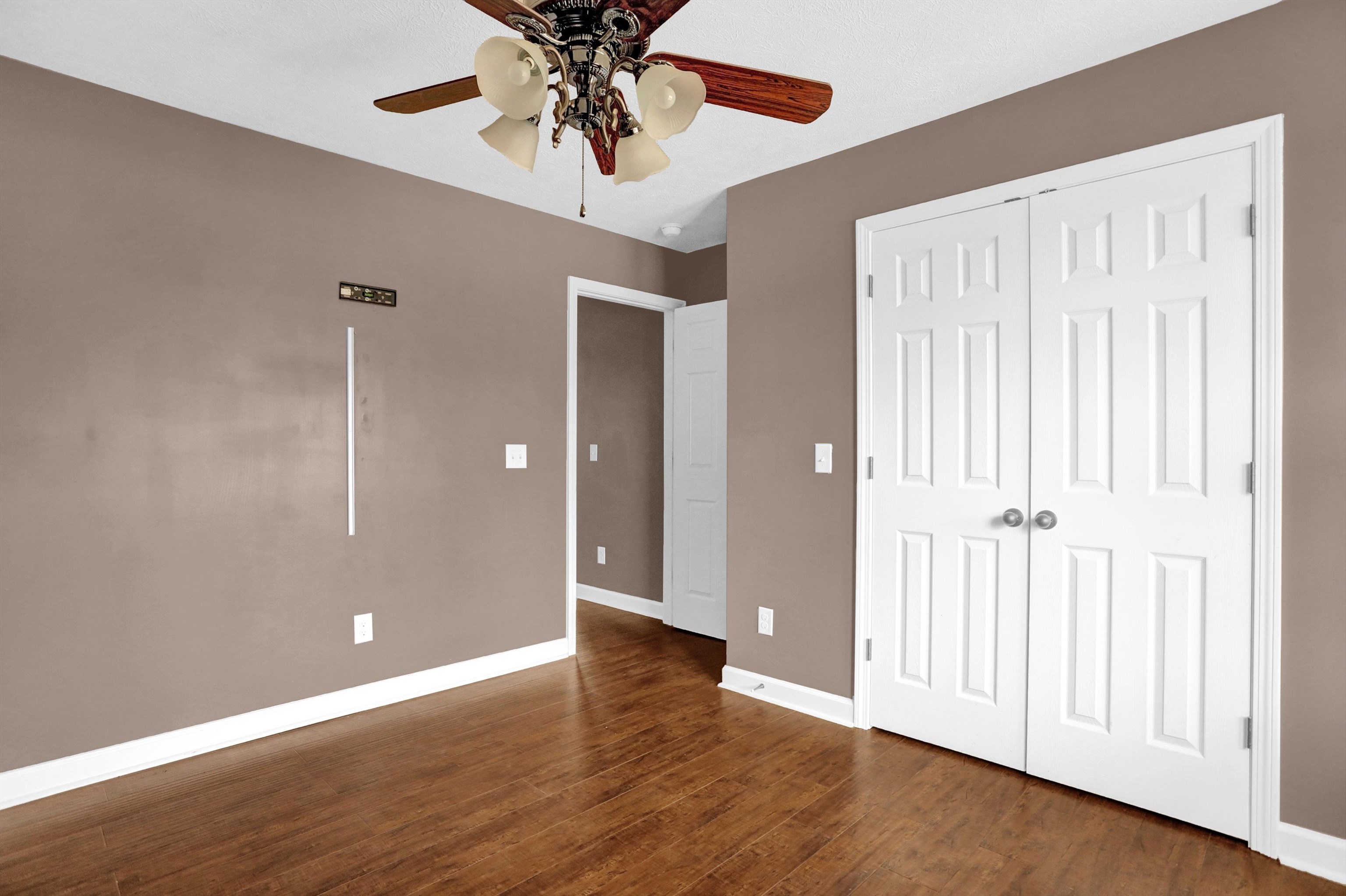 186 King Road Selmer, TN 38375 - Photo 14 of 30 wooden floor in an empty room with a window