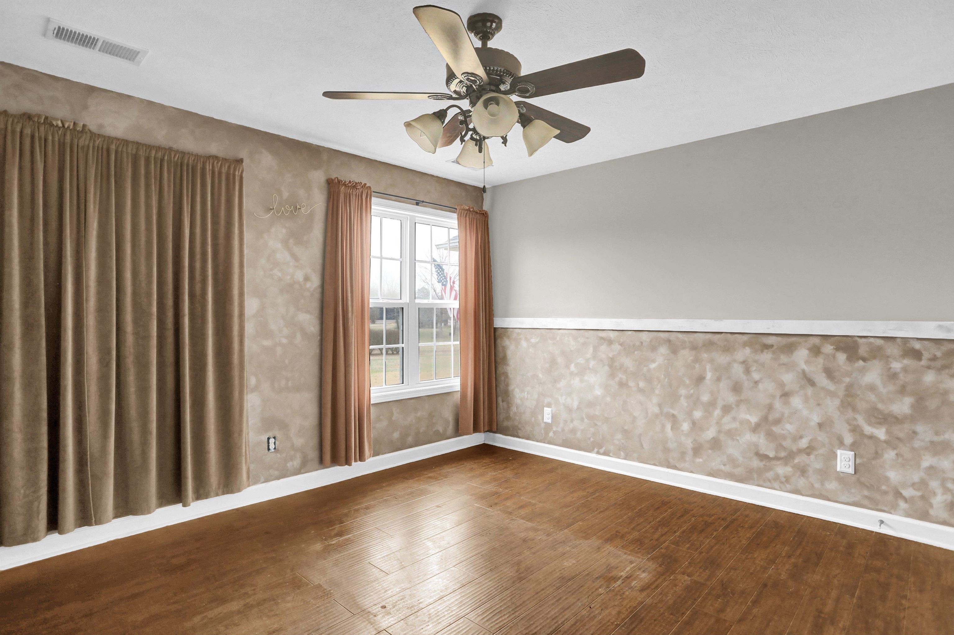 186 King Road Selmer, TN 38375 - Photo 20 of 30 wooden floor in an empty room with a window