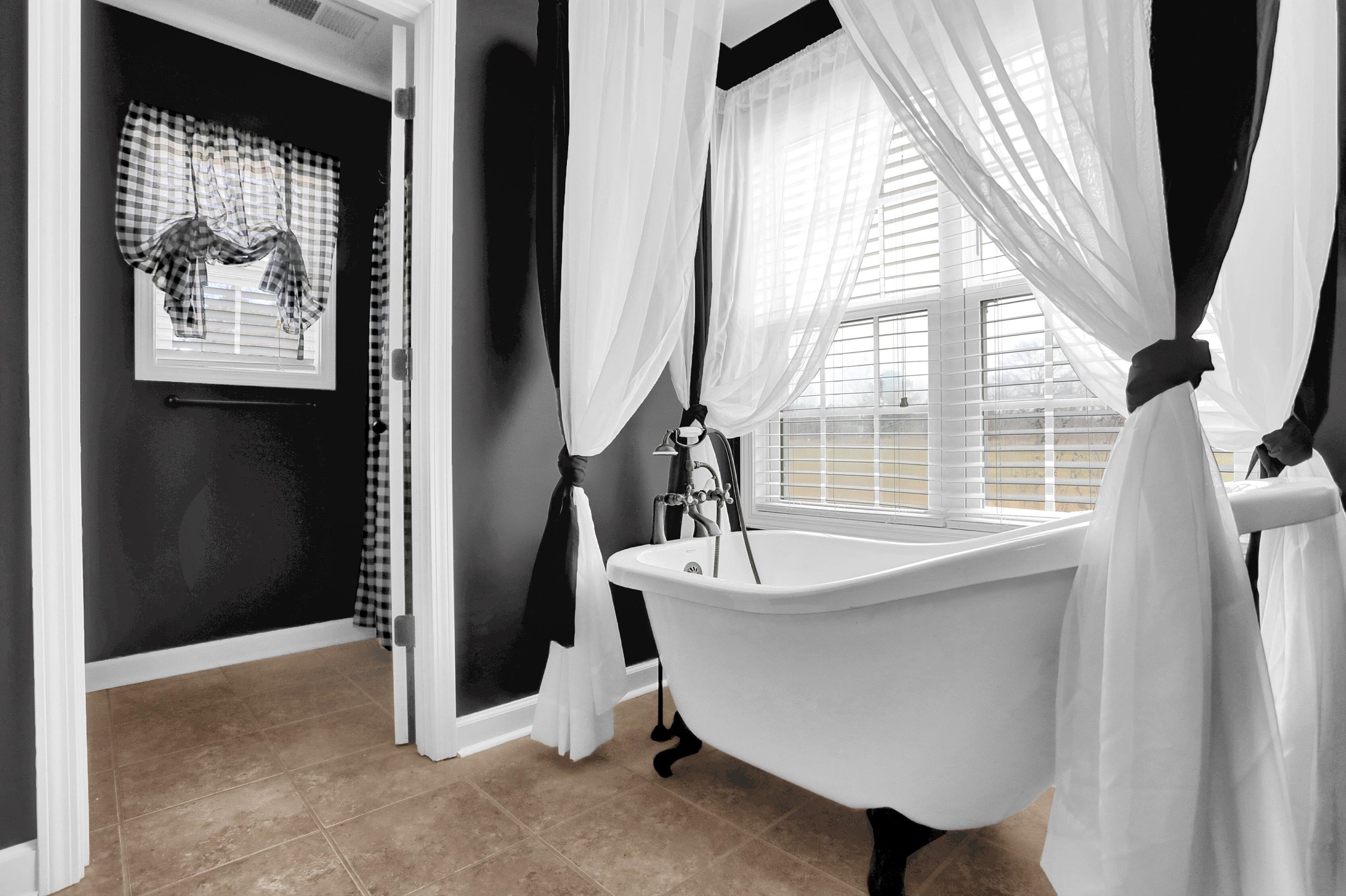 186 King Road Selmer, TN 38375 - Photo 21 of 30 a bath room with a sink and a window