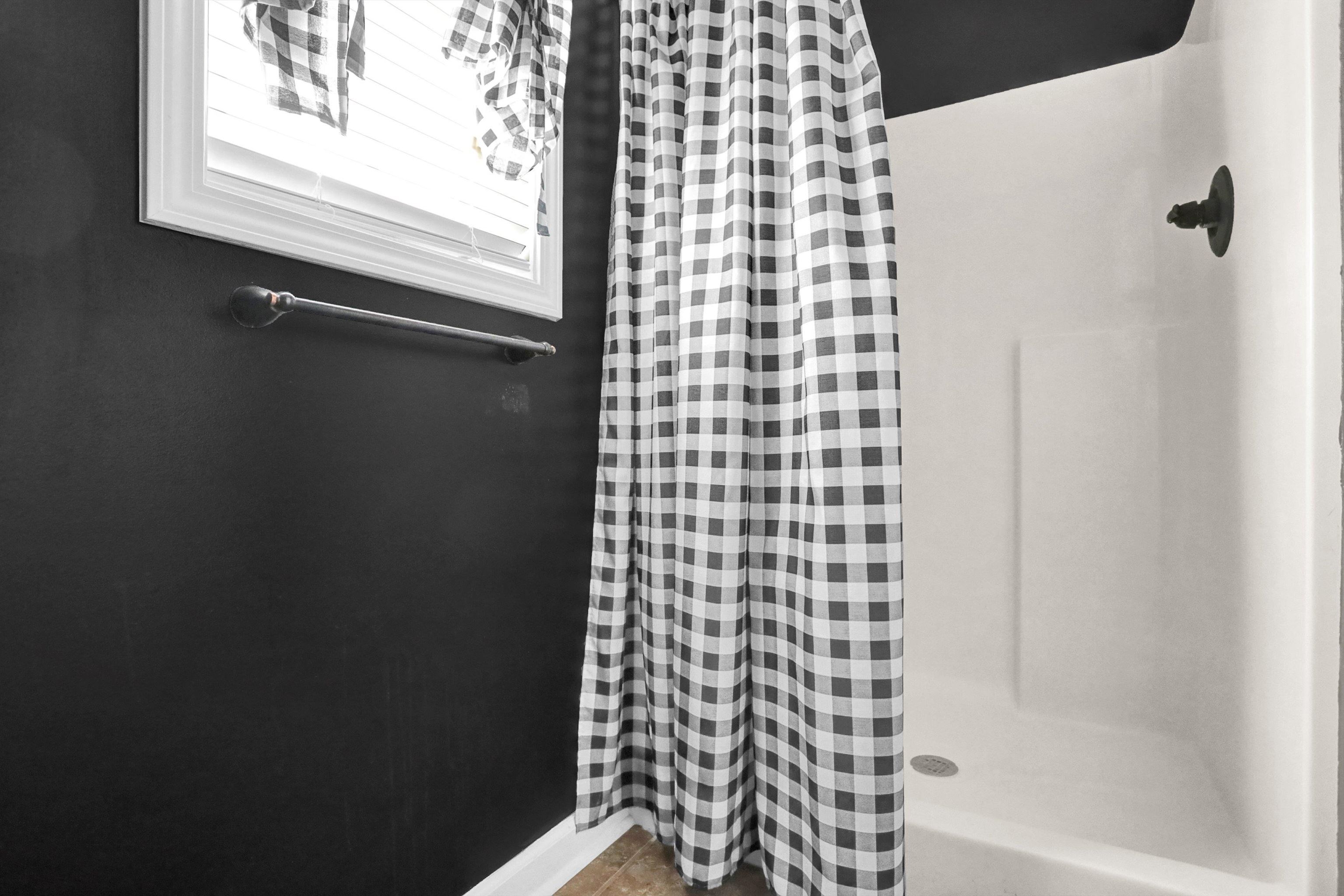 186 King Road Selmer, TN 38375 - Photo 22 of 30 a bathroom with a bathtub and shower