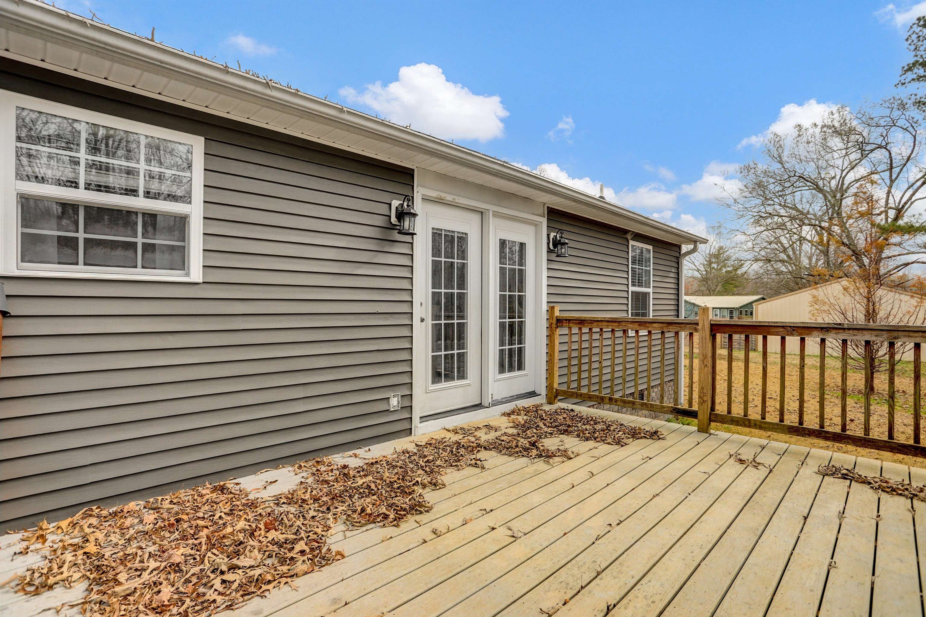 186 King Road Selmer, TN 38375 - Photo 26 of 30 a view of a wooden deck with a yard