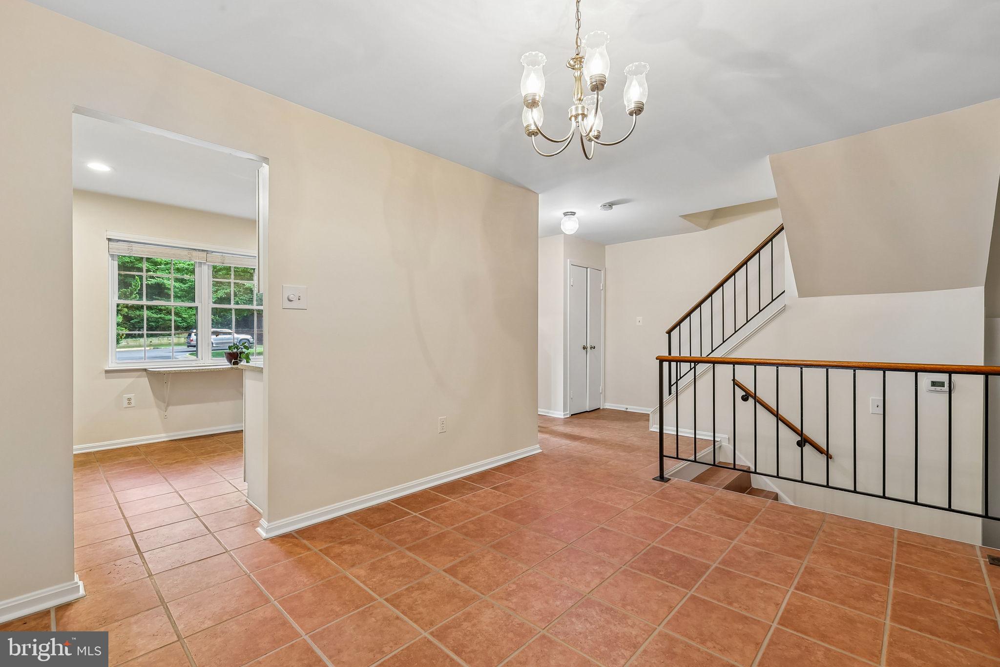 11714 Dry River Court Reston, VA 20191 - Photo 9 of 24 a view of an empty room with a window