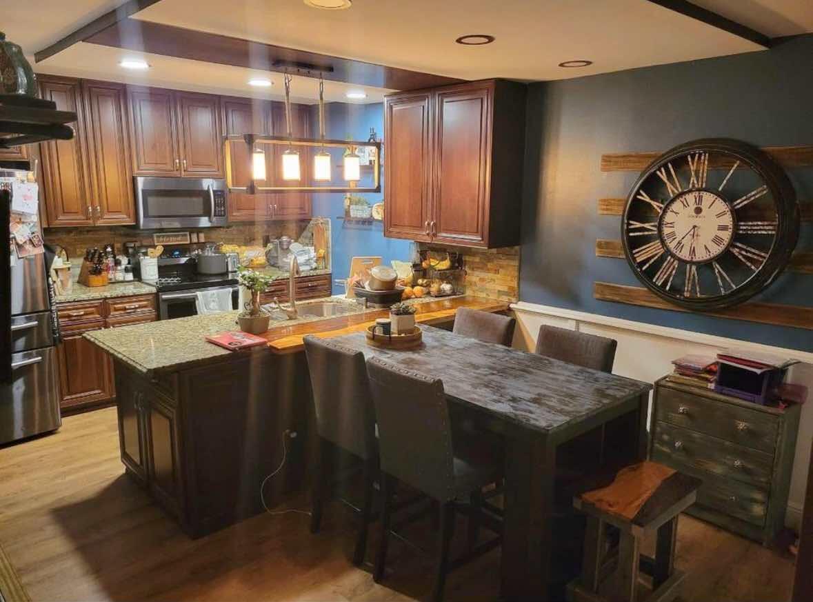 8282 Boca Rio Drive Boca Raton, FL 33433 - Photo 7 of 29 a kitchen with a sink and cabinets