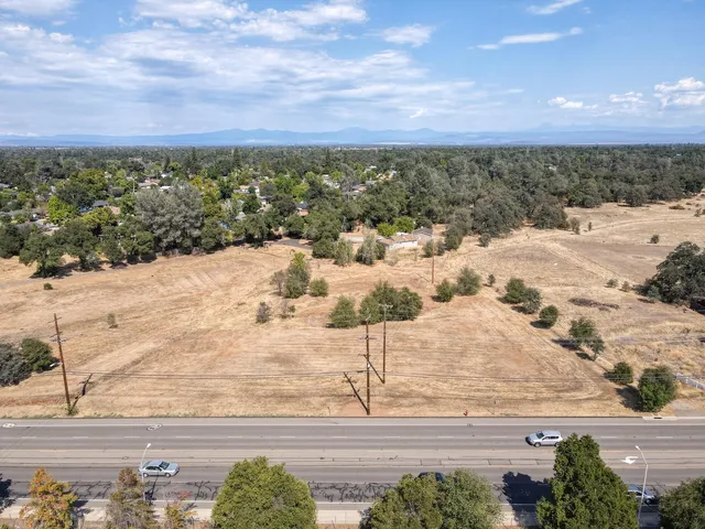 a view of a yard with an ocean