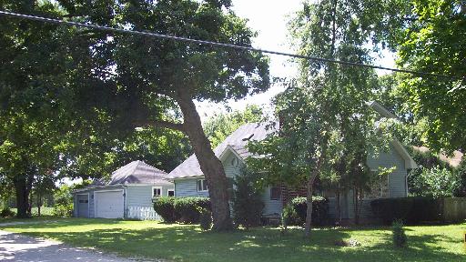 50 Bristol Ridge Road Bristol, IL 60512 - Photo 1 of 1 a front view of a house with garden