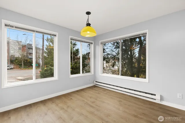 a view of kitchen with wooden floor