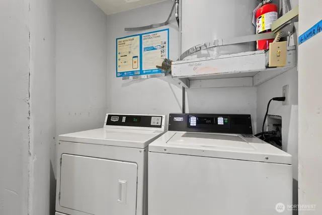 a room with a sink and a mirror