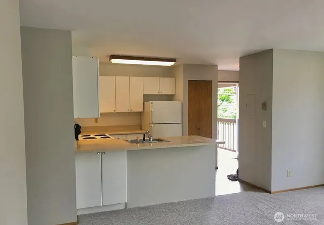 a view of a room with a window