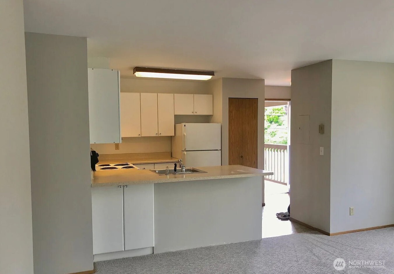 3660 Whitman Avenue North Seattle, WA 98103 - Photo 21 of 40 a room with a sink and a mirror