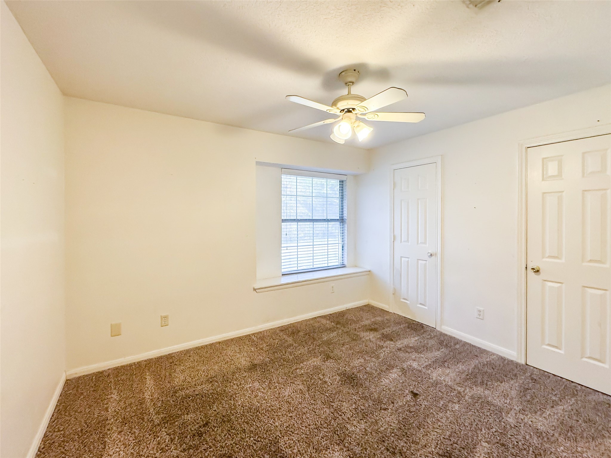 2006 Kilgore Road, Unit 101 Baytown, TX 77520 - Photo 14 of 20 a view of an empty room with a window