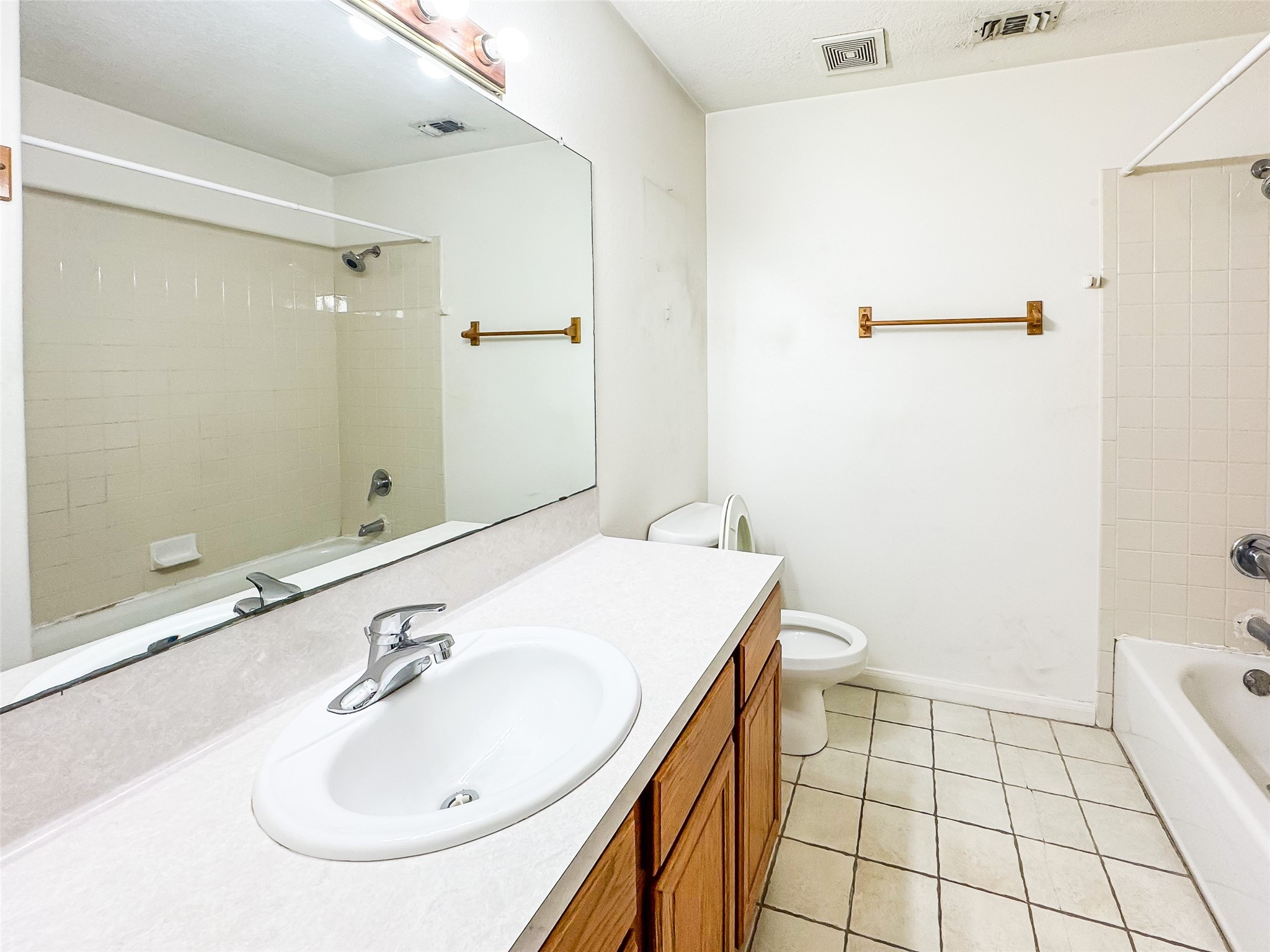 2006 Kilgore Road, Unit 101 Baytown, TX 77520 - Photo 17 of 20 a bathroom with a sink and a mirror
