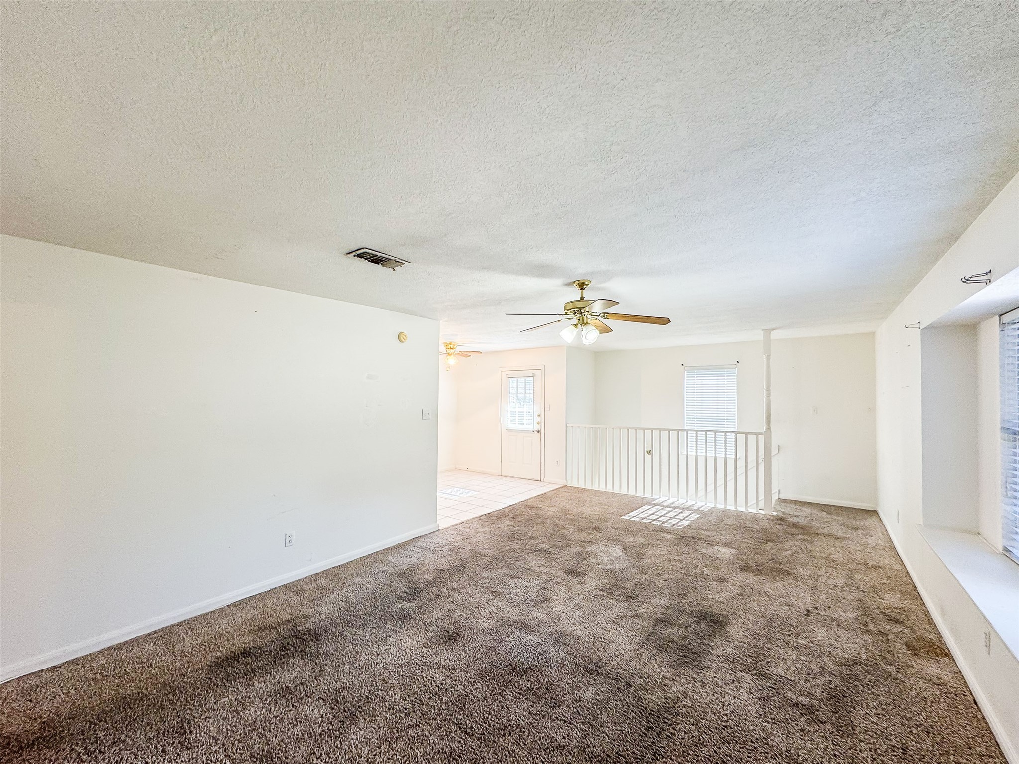 2006 Kilgore Road, Unit 101 Baytown, TX 77520 - Photo 5 of 20 a view of empty room with windows