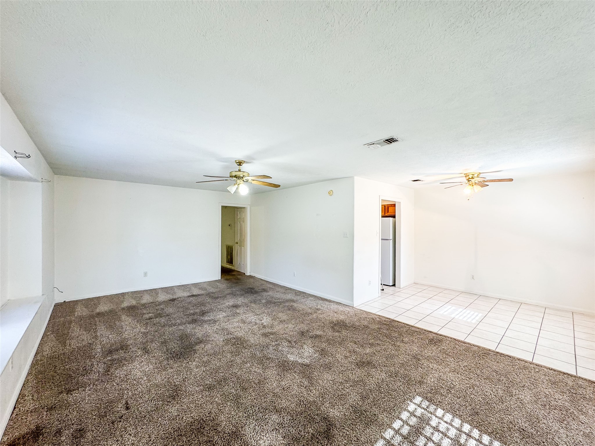2006 Kilgore Road, Unit 101 Baytown, TX 77520 - Photo 6 of 20 a view of a big room with carpet
