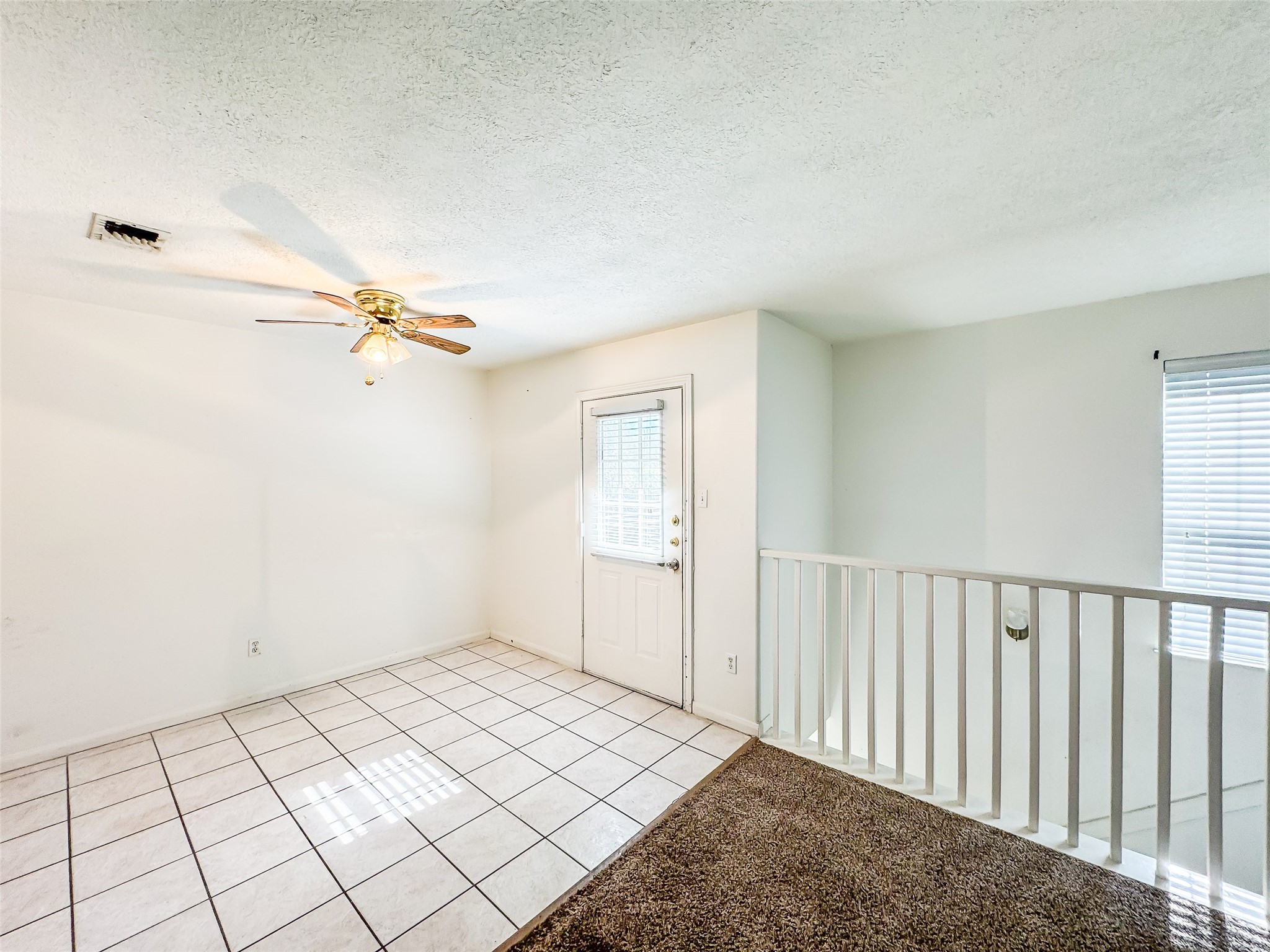 2006 Kilgore Road, Unit 101 Baytown, TX 77520 - Photo 8 of 20 a view of a room with a window and hardwood floor