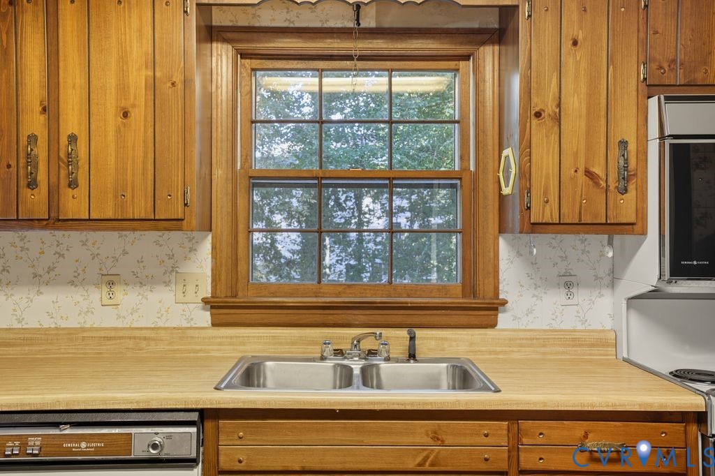 12805 Gloria Court Chester, VA 23831 - Photo 14 of 39 a view of a sink and a window