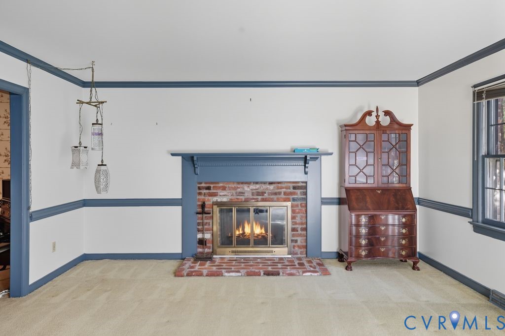 12805 Gloria Court Chester, VA 23831 - Photo 20 of 39 a living room with furniture and a fireplace