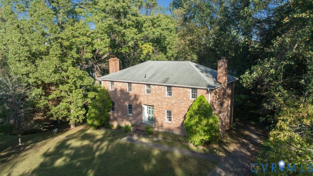 12805 Gloria Court Chester, VA 23831 - Photo 2 of 39 an aerial view of a house with yard and trees all around