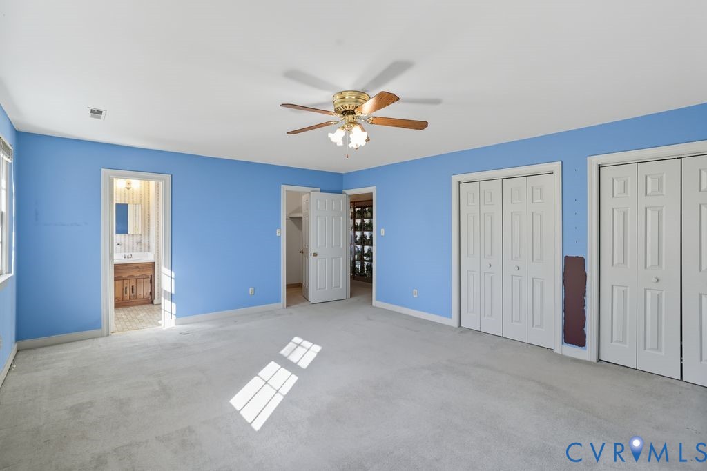 12805 Gloria Court Chester, VA 23831 - Photo 29 of 39 a view of a livingroom with a ceiling fan and window