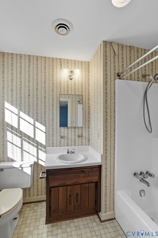 12805 Gloria Court Chester, VA 23831 - Photo 30 of 39 a bathroom with a sink a toilet and shower