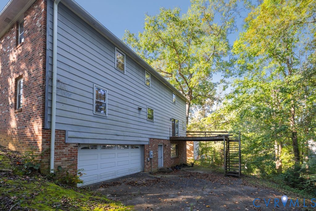 12805 Gloria Court Chester, VA 23831 - Photo 31 of 39 a front view of a house with a garden
