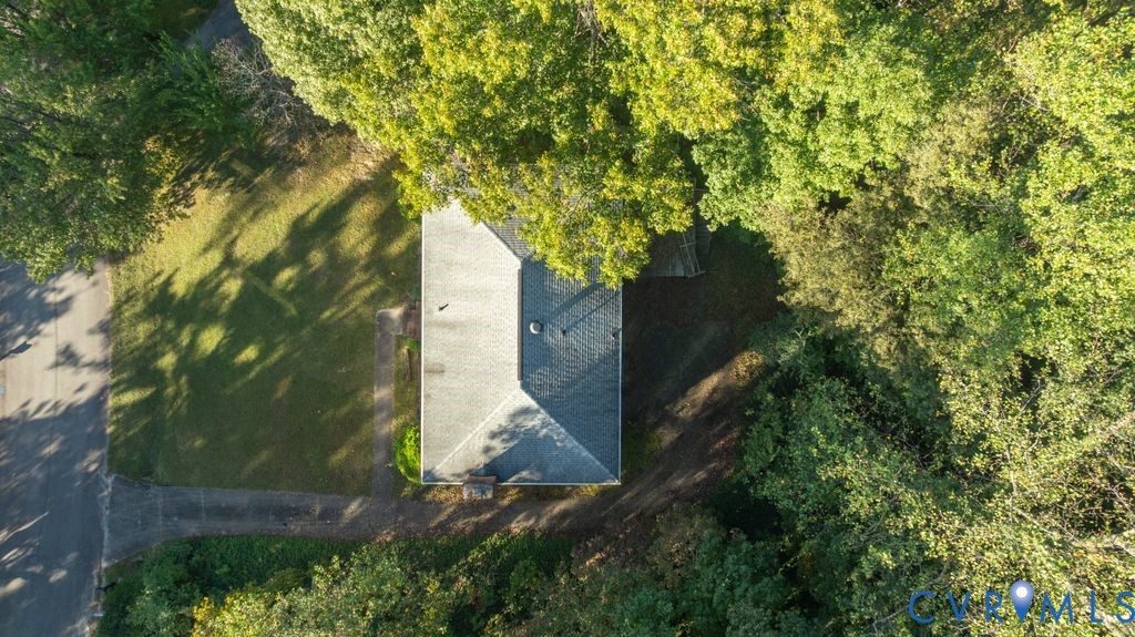 12805 Gloria Court Chester, VA 23831 - Photo 34 of 39 a backyard of a house with lots of green space