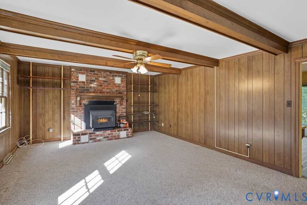 12805 Gloria Court Chester, VA 23831 - Photo 6 of 39 a view of a livingroom with fireplace and stairs