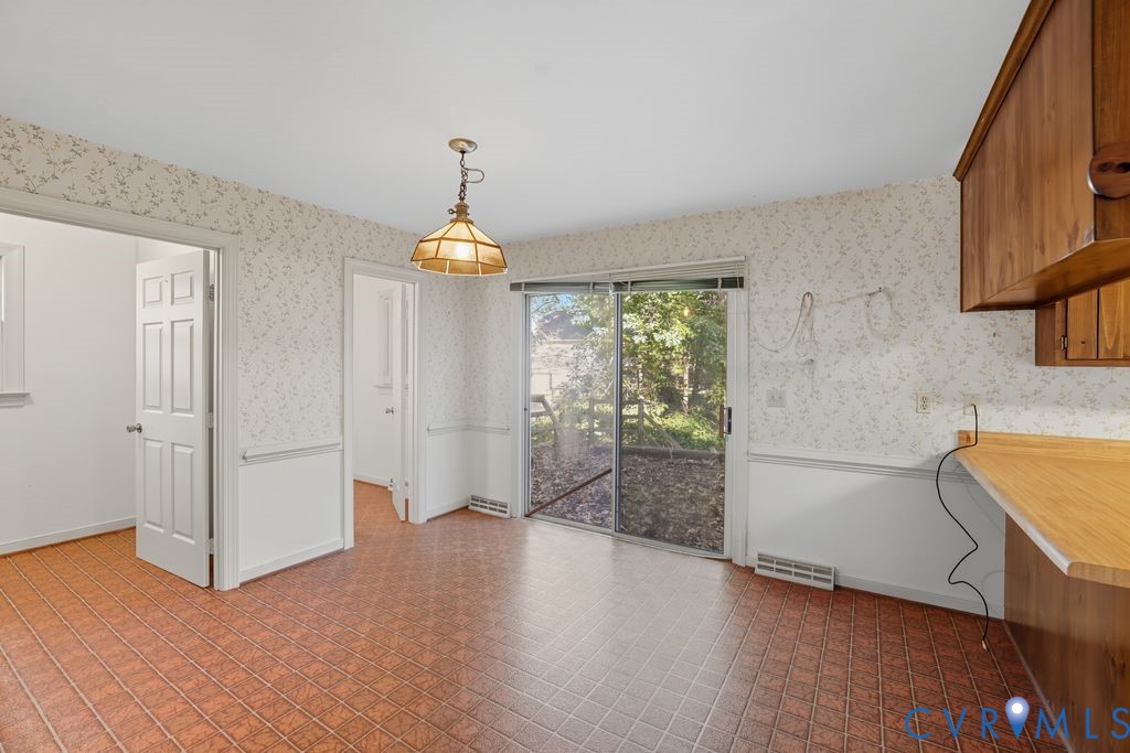 12805 Gloria Court Chester, VA 23831 - Photo 8 of 39 a view of a room with cabinet and wooden floor