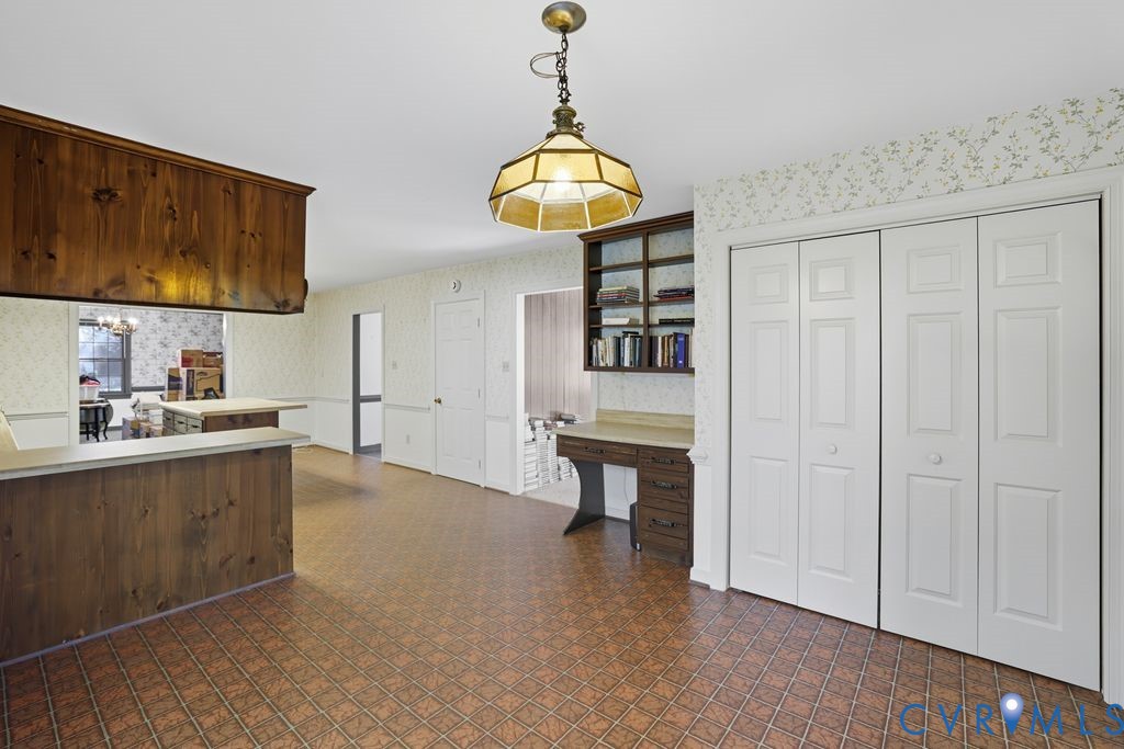 12805 Gloria Court Chester, VA 23831 - Photo 9 of 39 a view of an empty room with window and cabinet