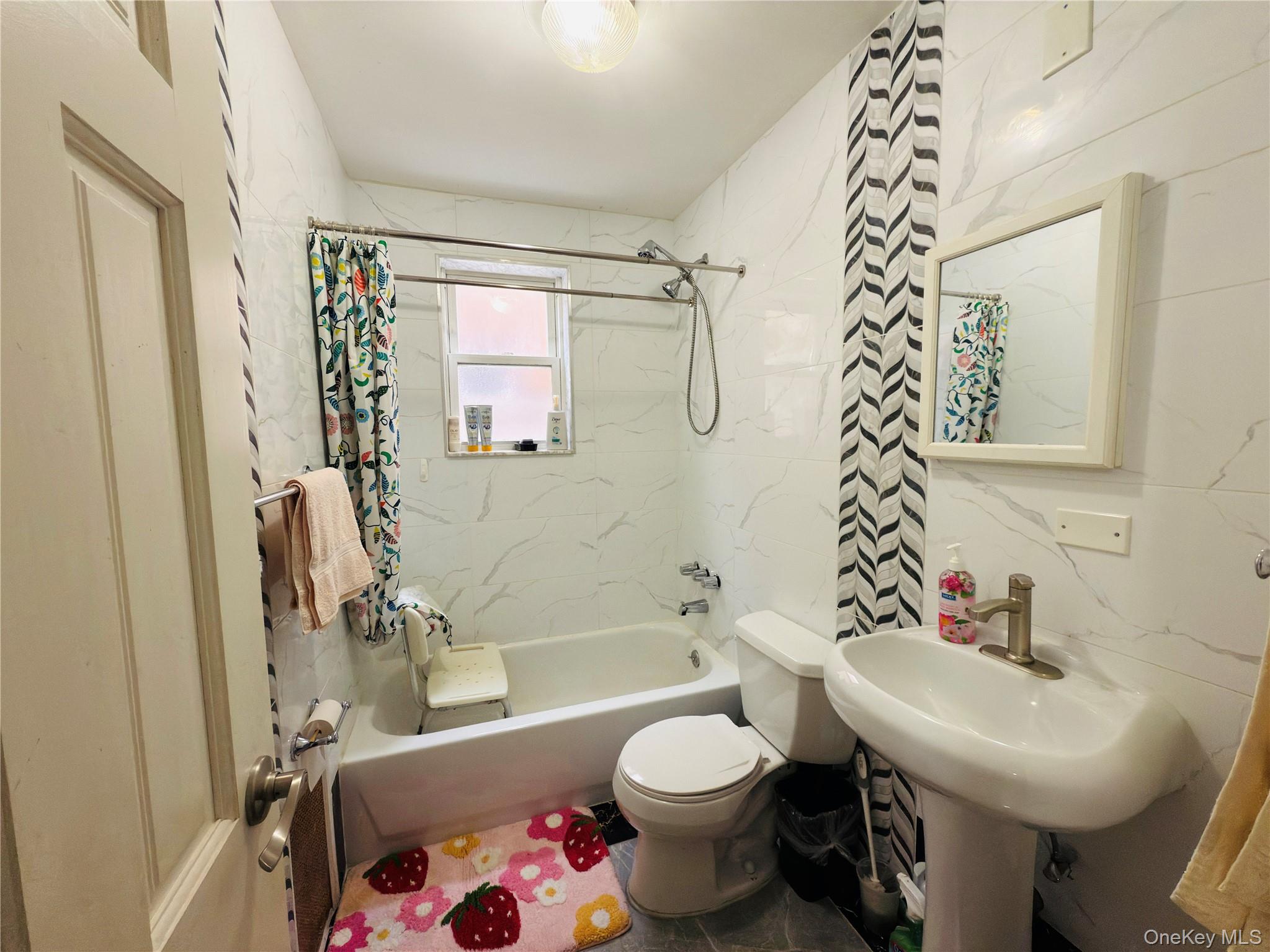 2154 Haight Avenue Bronx, NY 10461 - Photo 14 of 40 a bathroom with a sink toilet and shower