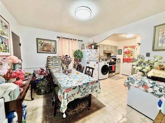 a very nice looking living room with a large window