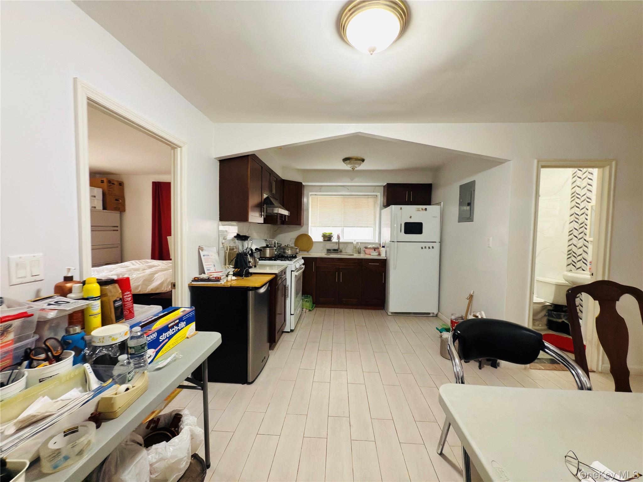 2154 Haight Avenue Bronx, NY 10461 - Photo 9 of 40 a living room with furniture and a flat screen tv