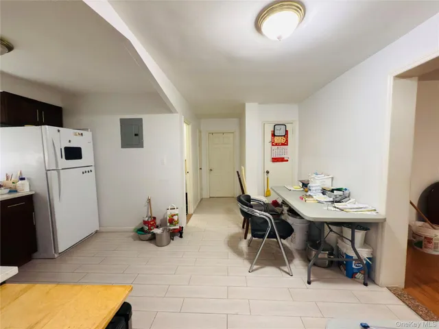 a bed room with a bed and a desk