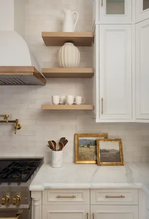 a kitchen with a stove and cabinets