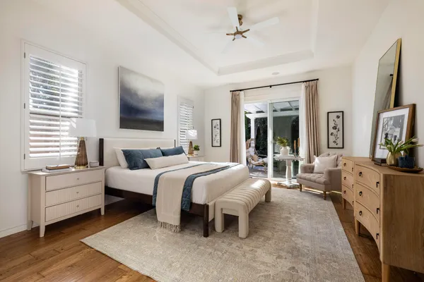 a bed room with a bed and a television