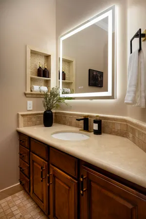 a bathroom with a sink and a mirror