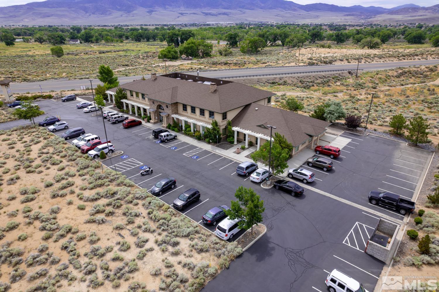 5 Pine Cone Road, Unit 105 Dayton, NV 89403 - Photo 3 of 12 an aerial view of a house with a lake view