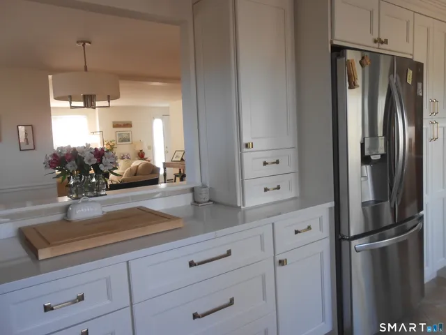 a kitchen with appliances and cabinets