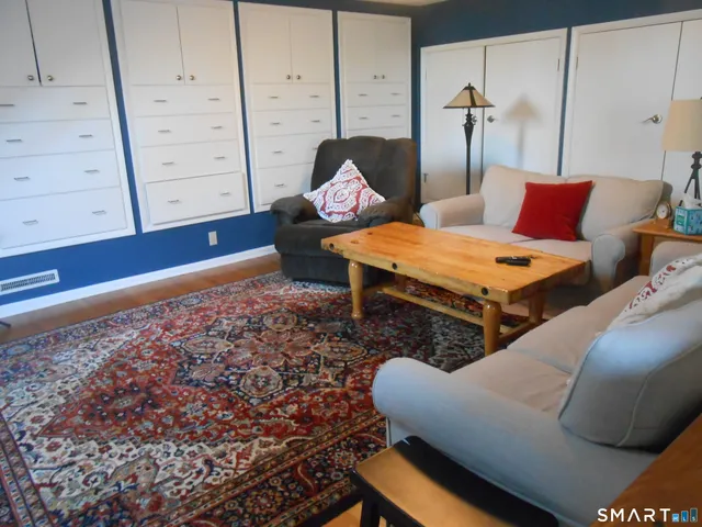 a view of a door and a window