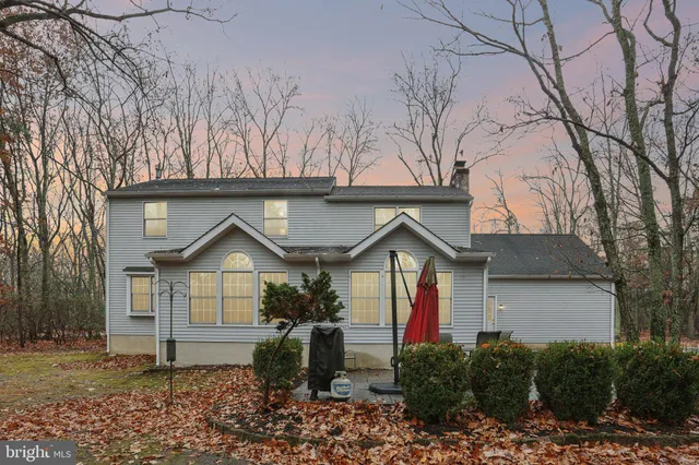a view of a chairs and tables in the balcony