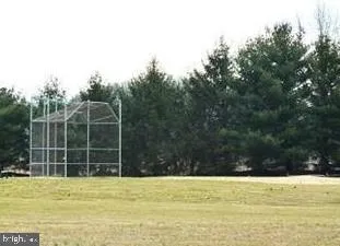 a view of a building with sitting area